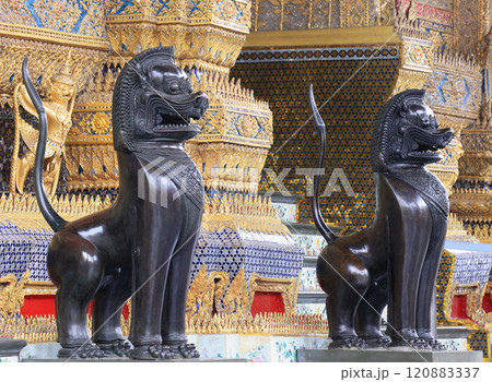 Traditional Black Dragon statues, exterior detail of The Emerald Buddha in Wat Phra Kaew. 120883337