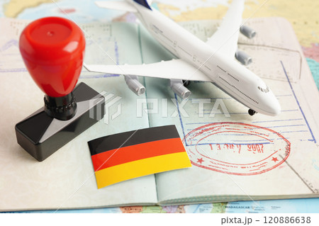 Germany flag and passport with airplane for travel. Germany flag and passport with airplane for travel. 120886638