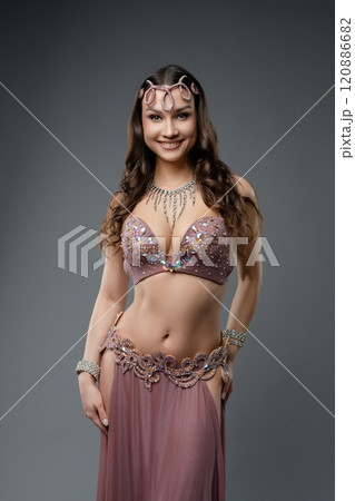 Dancer in traditional costume displays grace during performance Dancer in traditional costume displays grace during performance 120886682