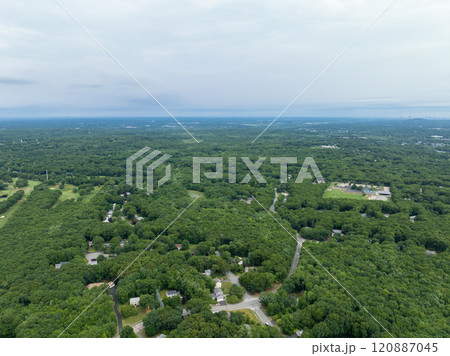 Aerial view of Suburban neighborhood Norfolk County, Massachusetts with green forest, with big villa 120887045