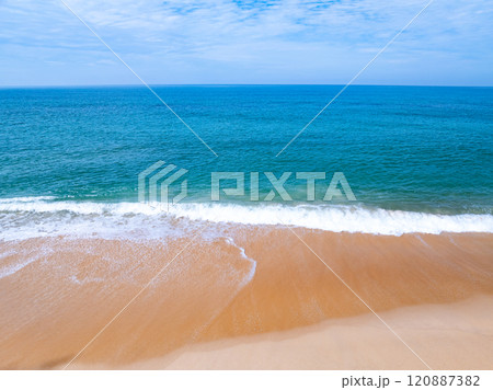Amazing sea surface in summer season background,Nature waves sea beach background,High angle view waves seascape nature view,Wide angle drone shot,Top view beach sand 120887382