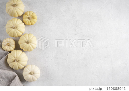 Autumn frame made of white pumpkins on table background. Fall, Halloween, Thanksgiving concept. Top view. Empty copy space. 120888941