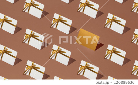 Isometric pattern of credit cards, gift cards, bonus cards. consumer concept, on a mocha colors background. Gifts for Christmas 120889636