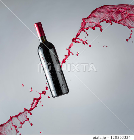 Bottle of red wine and splashes. Bottle of red wine and splashes. 120893324