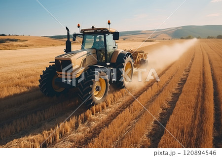 Cultivation of the field by tractors after harvesting. 120894546