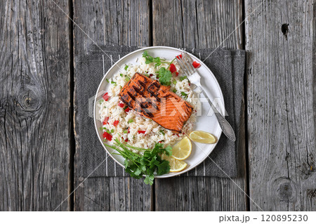 grilled red salmon fillet with rice, top view grilled red salmon fillet with rice, top view 120895230