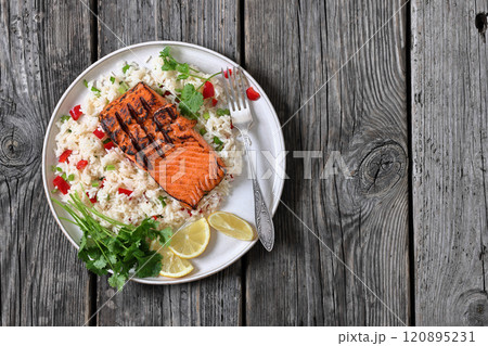 grilled red salmon fillet with rice, top view grilled red salmon fillet with rice, top view 120895231