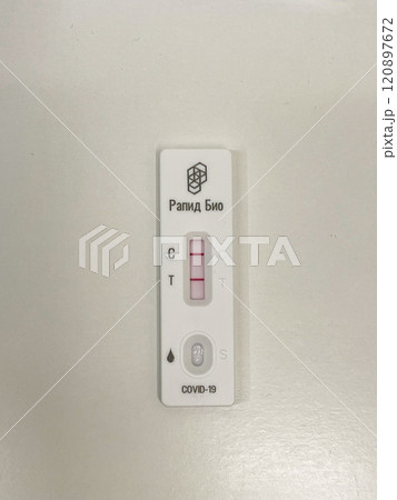 Test positive using a COVID-19 rapid testing device Test positive using a COVID-19 rapid testing device 120897672