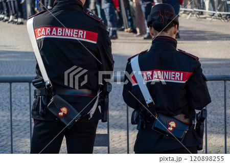 Two Carabinieri officers standing guard during a public event in Italy Two Carabinieri officers standing guard during a public event in Italy 120898255