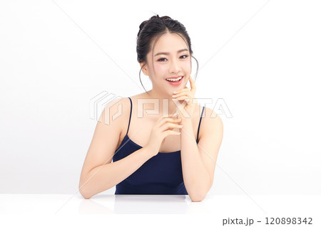 Beautiful young asian woman with clean fresh skin on white background, Face care, Facial treatment, Cosmetology, beauty and spa, Asian women portrait. Beautiful young asian woman with clean fresh skin on white background, Face care, Facial treatment, Cosmetology, beauty and spa, Asian women portrait. 120898342