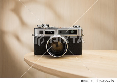 A classic rangefinder film camera. A classic rangefinder film camera. 120899319