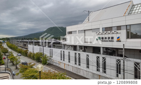 Karuizawa Station building and a mountain in Nagano, Japan. May 27, 2024 Karuizawa Station building and a mountain in Nagano, Japan. May 27, 2024 120899808