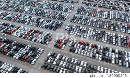 Aerial view new car lined up in the port for dealership business import and export, New car lined up parking lot outside an automobile automotive factory distribution for sale. 120900846