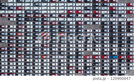 Aerial view new car lined up in the port for dealership business import and export, New car lined up parking lot outside an automobile automotive factory distribution for sale. 120900847