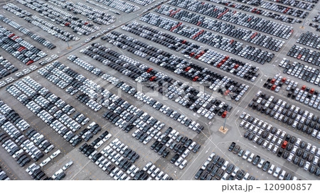 Aerial view new car lined up in the port for dealership business import and export, New car lined up parking lot outside an automobile automotive factory distribution for sale. Aerial view new car lined up in the port for dealership business import and export, New car lined up parking lot outside an automobile automotive factory distribution for sale. 120900857
