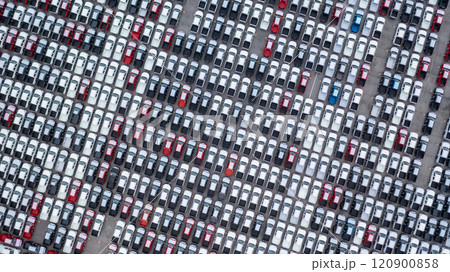 Aerial view new car lined up in the port for dealership business import and export, New car lined up parking lot outside an automobile automotive factory distribution for sale. Aerial view new car lined up in the port for dealership business import and export, New car lined up parking lot outside an automobile automotive factory distribution for sale. 120900858