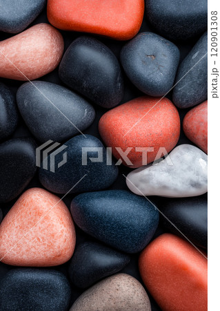 Polished opal pebble background. Smooth round colorful gravel stone texture 120901308