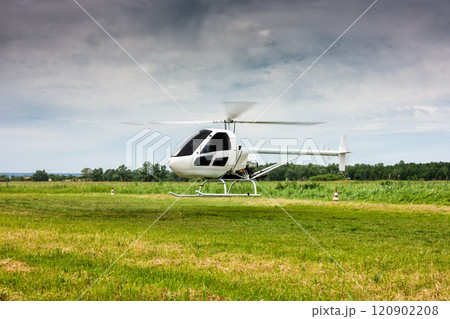 Landing a small helicopter in the field Landing a small helicopter in the field 120902208