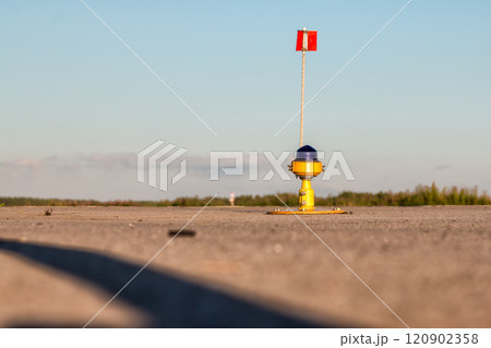 Taxiway, side row lights at the airport Taxiway, side row lights at the airport 120902358