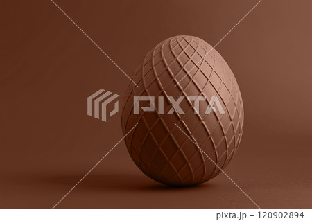 Mocha mousse brown Easter egg with geometric designs on a matching backdrop. Modern trendy tone hue shade 120902894