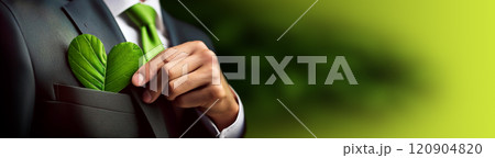 Closeup of a Businessman Putting a Heart-Shaped Green Leaf in His Pocket - Generative Ai 120904820