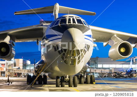 Cargo airplane at the airport apron in the night 120905818