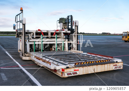 Aircraft container and pallet loader at the airport apron Aircraft container and pallet loader at the airport apron 120905857