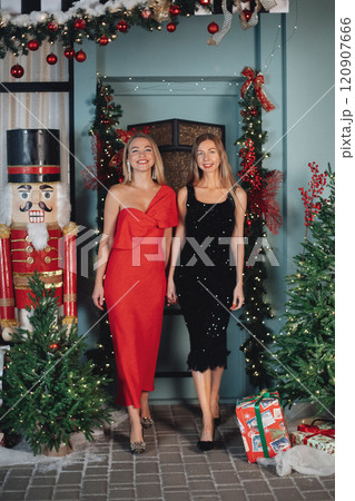 two sisters Beautiful elegant women in black and 120907666