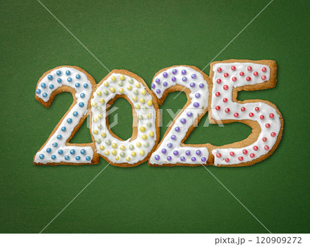 Colorful Iced Cookie Numbers Forming 2025 on a Green Background Colorful Iced Cookie Numbers Forming 2025 on a Green Background 120909272