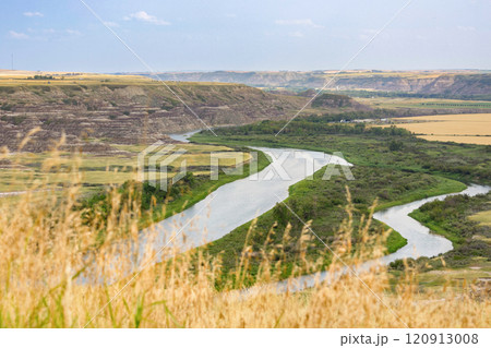 View to the river in the valley among badlands from the top of the hill. 120913008
