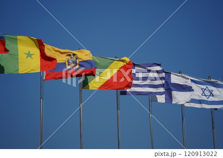 Flags of Ecuador and the Republic of the Congo fluttering in the wind 120913022