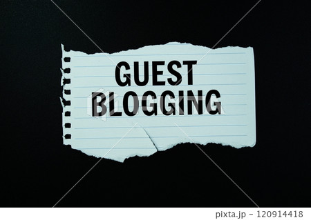 Guest Blogging text written on paper torn top view on black background Guest Blogging text written on paper torn top view on black background 120914418