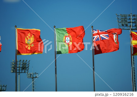 Portuguese and international flags fluttering in the stadium Portuguese and international flags fluttering in the stadium 120916216