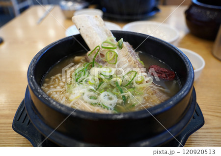 Short Rib Soup is a traditional Korean food made by boiling beef bones for a long time 120920513