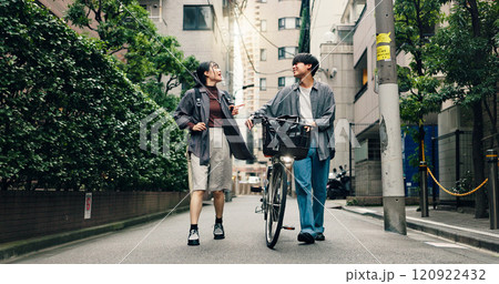 Fashion, walking and bike with Japanese couple in city for streetwear, genz style and travel. Date, urban and love with asian man and woman talking in outdoors for bonding, casual and cool together 120922432
