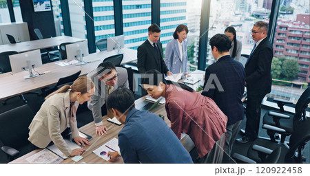 Employees, accounting paperwork and office meeting for review, communication and teamwork in Japan. Business people, investment report and workplace for briefing, revenue project and brainstorming 120922458