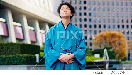 Kimono, fashion and thinking with Japanese man in city for Shinto ceremony, culture and vision. Respect, travel and reflection with person in japan for traditional clothes, Buddhism and festival 120922460