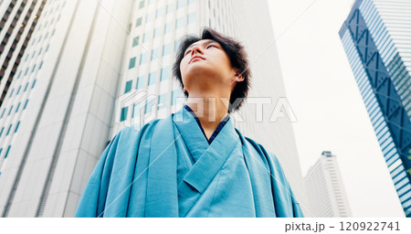 Japanese man, thinking and city travel with traditional clothes, outfit and yukata for heritage. Below, guy and pride for culture, journey and sightseeing with casual dress kimono fashion downtown Japanese man, thinking and city travel with traditional clothes, outfit and yukata for heritage. Below, guy and pride for culture, journey and sightseeing with casual dress kimono fashion downtown 120922741