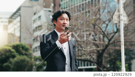 Japanese, business and man with phone speaker for discussion, schedule update and negotiation chat. Male person, mobile sound and communication of audio, contact information and urban travel in Japan 120922929