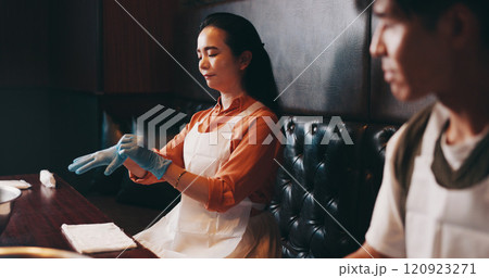 Cooking, gloves and start with Japanese woman in restaurant for fine dining course, dinner and learning recipe. Ingredients, culture and food with asian people in class for diet, menu and meal prep Cooking, gloves and start with Japanese woman in restaurant for fine dining course, dinner and learning recipe. Ingredients, culture and food with asian people in class for diet, menu and meal prep 120923271
