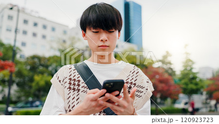 Phone, travel and Japanese man in city with navigation for university with mobile app. Outdoor, cellphone and male student with directions for college campus with international exchange program. 120923723