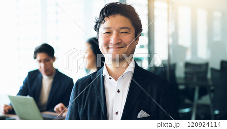 Portrait, Japanese businessman and pride in office for teamwork, collaboration and networking. Male person, happy and meeting as project manager for architecture firm with confidence, smile and staff 120924114