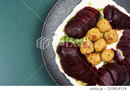 Plate of falafel balls with vegetables. 120924534