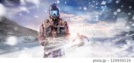 Ski poster concept. Portrait of a skier in the mountains. In the background, a skier in a suit is descending the mountain slope at maximum speed in a snowstorm. Snowfall Ski poster concept. Portrait of a skier in the mountains. In the background, a skier in a suit is descending the mountain slope at maximum speed in a snowstorm. Snowfall 120930119