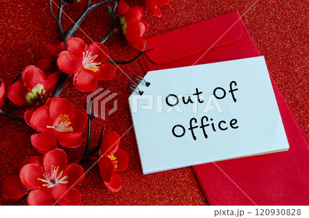 Top view of Out Of Office text with Chinese New Year decoration. Copy space and Chinese New Year celebration. 120930828