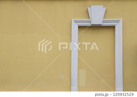 False window in a plastered wall, altered color scheme, architectural background in pastel colors. 120932529