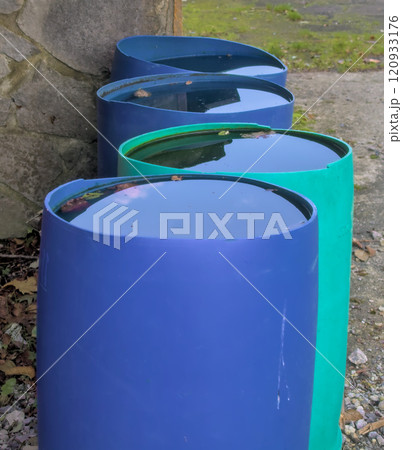 colored canisters with water 120933176