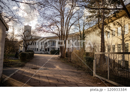 Quiet Courtyard by an Old Building in Evening Glow 120933384