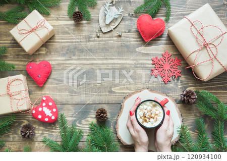 Christmas composition with giftbox, deer, red hearts. Xmas Holiday card. Christmas composition with giftbox, deer, red hearts. Xmas Holiday card. 120934100