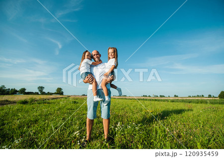 dad and two kids.Nature, blue sky, family rest 120935459